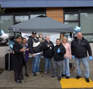 The ALK team posing for a photo at the Trunk or Treat event.